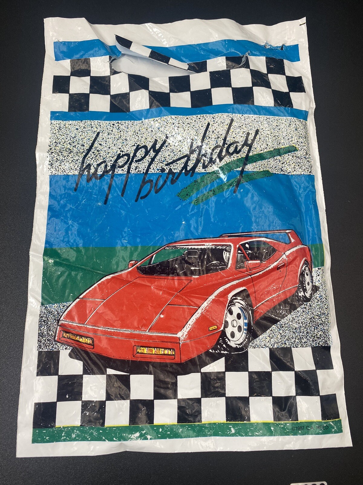 Vintage Red Sports Car Paper Table Cover that reads Happy Birthday