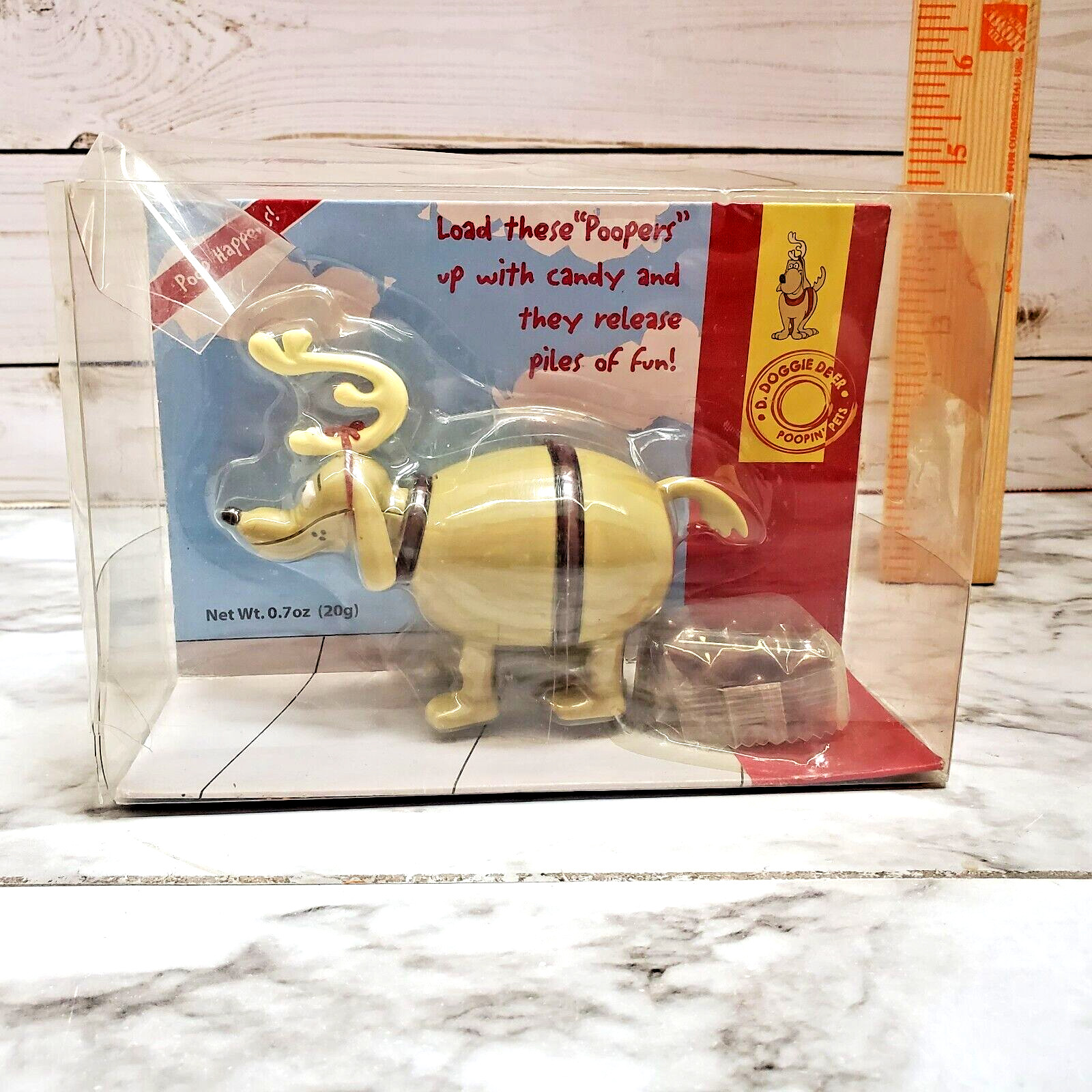 D. Doggie Deer Poopin’ Pet Candy Dispenser Gag Gift Christmas Grinch Dog Movie