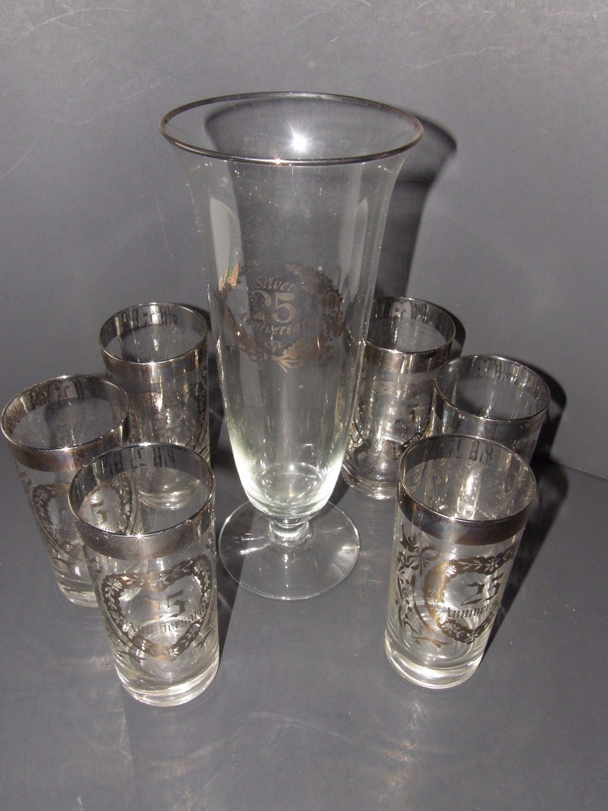 LOT OF 7 PCS. 25th SILVER ANNIVERSARY PITCHER AND GLASS SET WITH SILVER ACCENTS