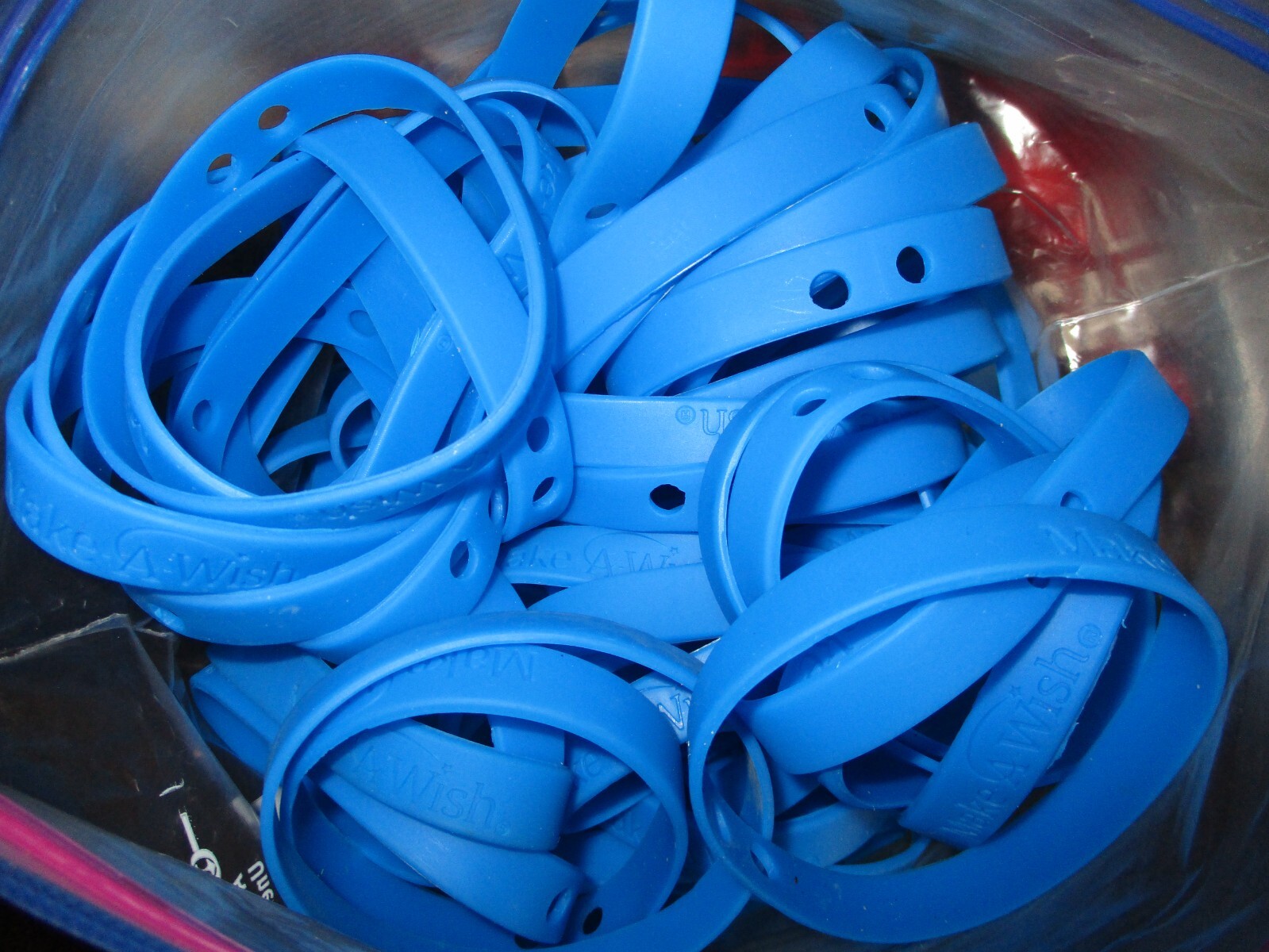LOT of 150 Blue Rubber/Silicone Make A Wish wristbands (logo does not stand out)