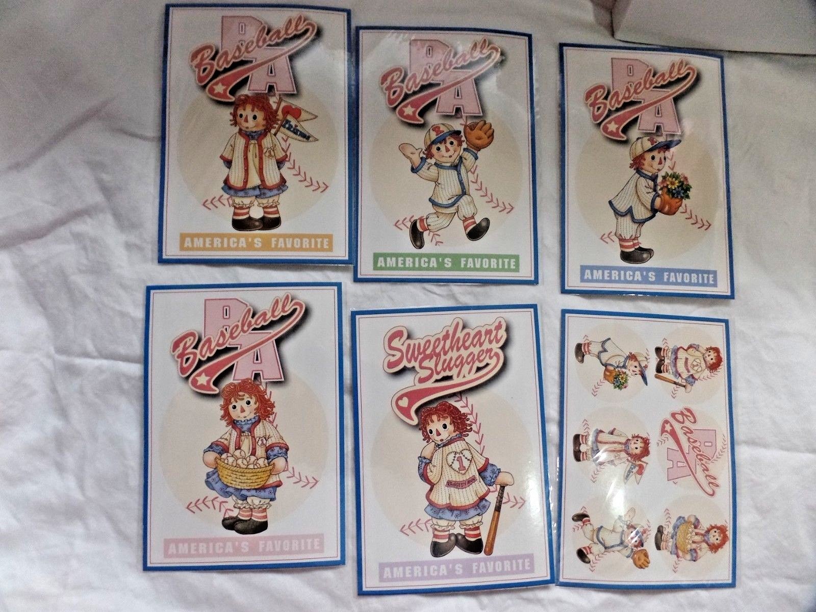 Raggedy Ann & Andy Postcards Place Mat Coasters 2002 Plate Notebook Baseball LOT