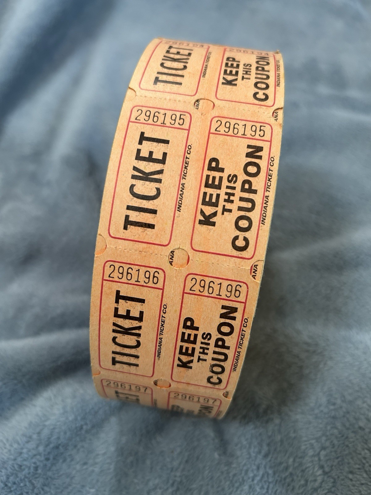 Large Roll of Orange Double Stub Raffle Tickets Split the Pot 50/50.