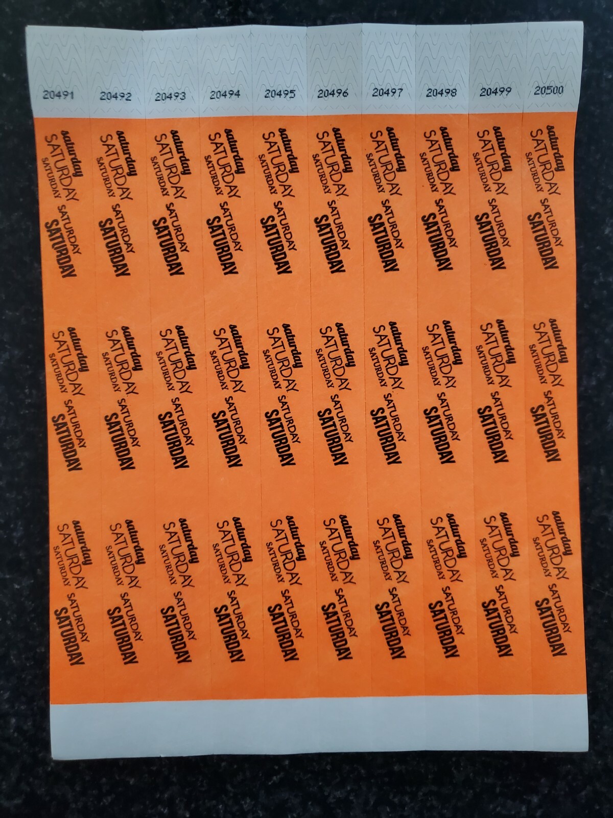 100 3/4″ NEON ORANGE (Saturday) TYVEK WRISTBANDS, PAPER WRISTBANDS