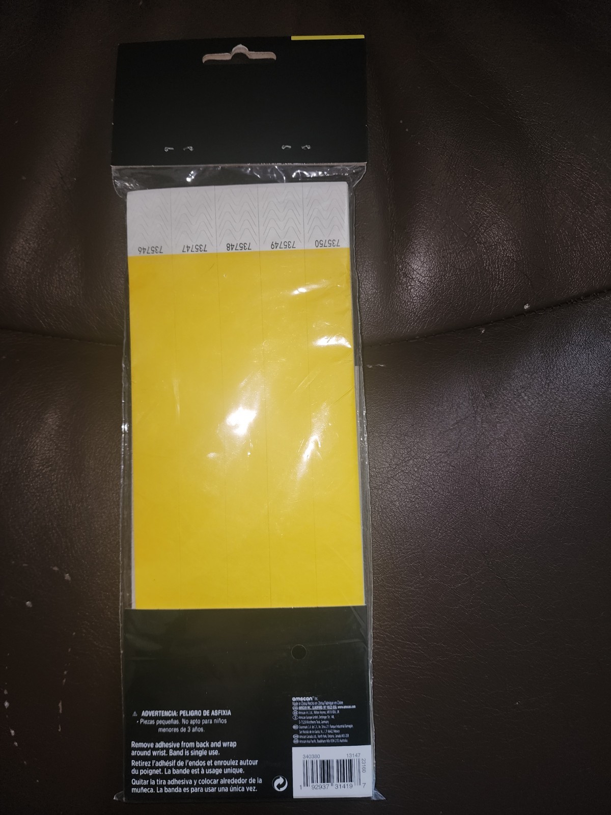 BRAND NEW AMSCAN WRISTBANDS YELLOW, 250 COUNT, GLOWS UNDER BLACK LIGHT