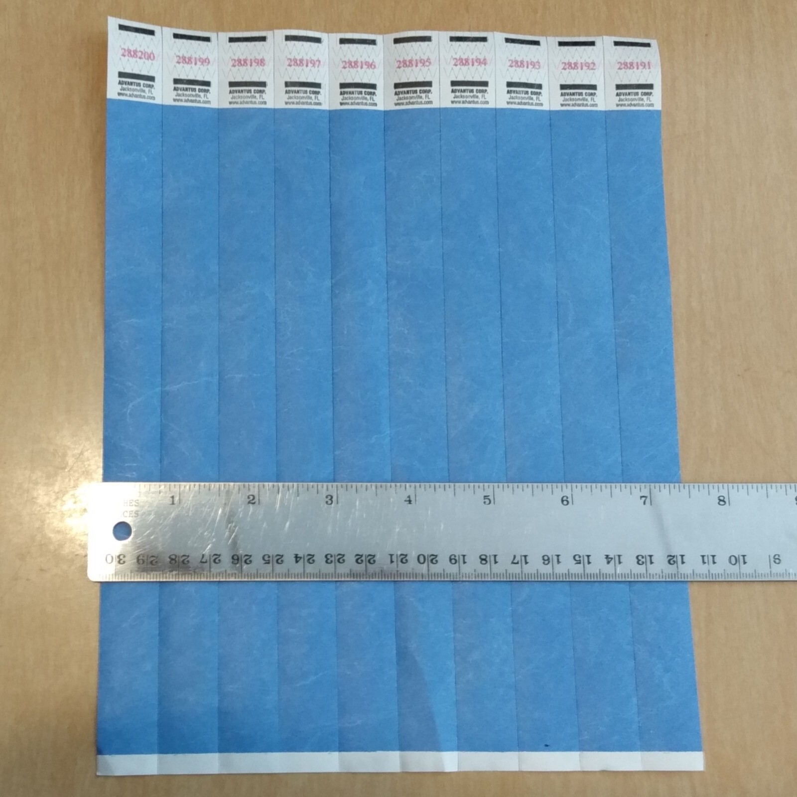 87 blue wristbands sequentially numbered USA Advantus Corp child safety