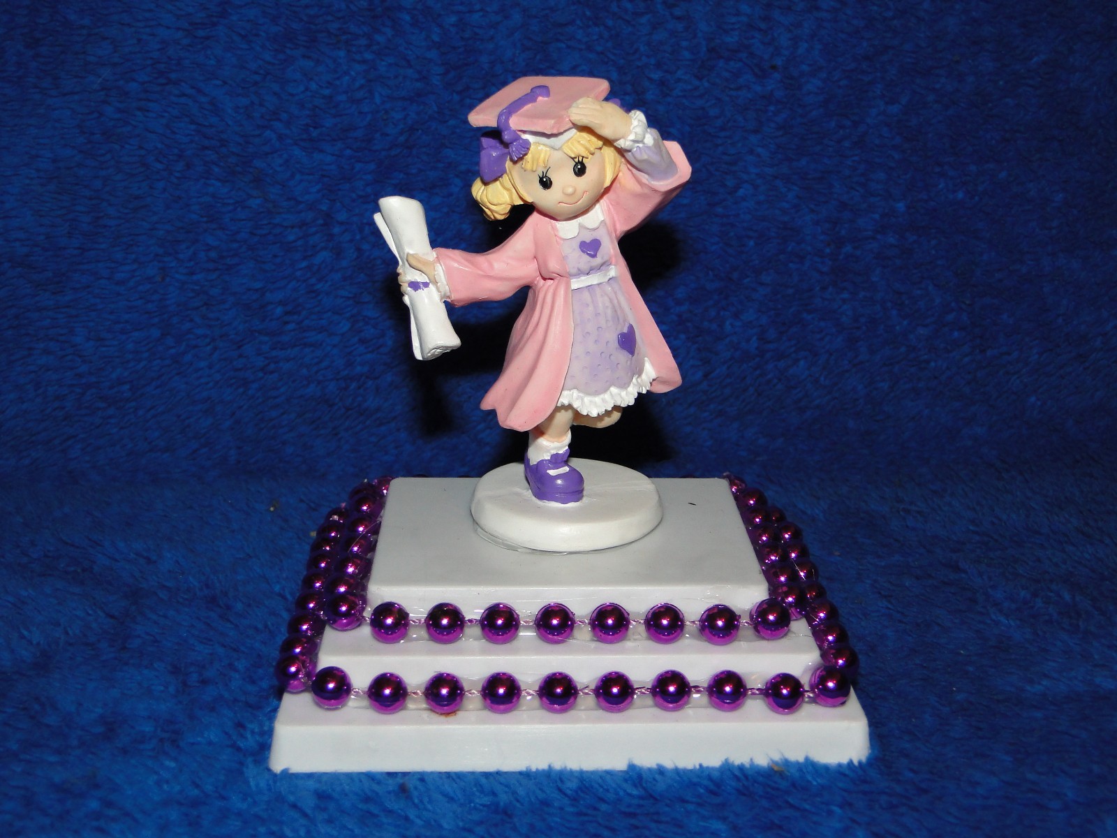 New Wilton Graduating Girl in Pink and purple Cake topper