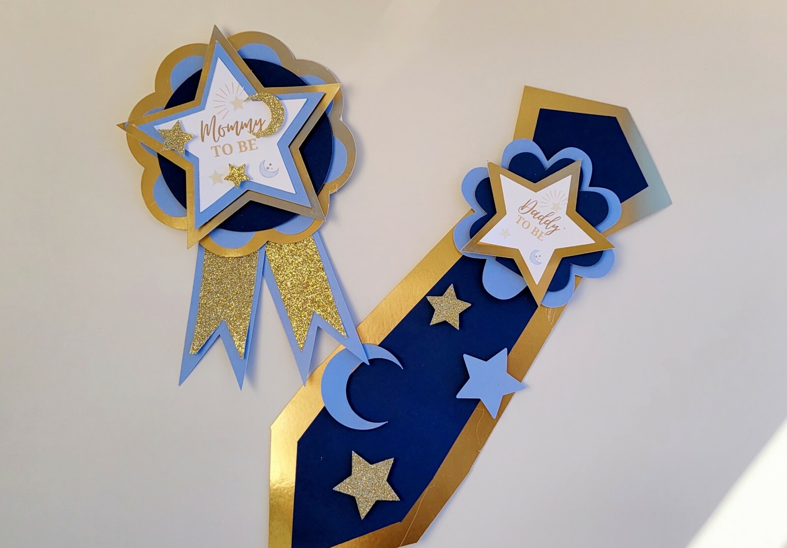 Mommy and daddy to-be baby shower corsage