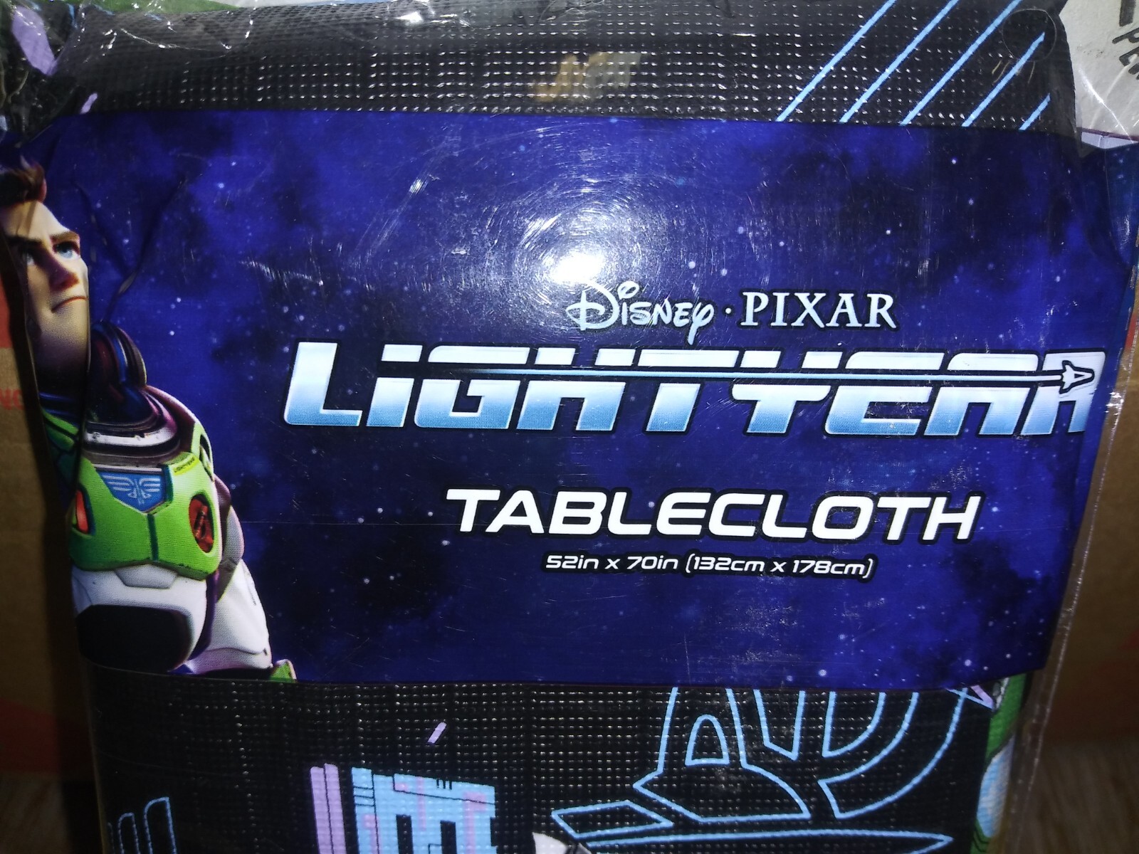 DISNEY’S 52X70 REUSEABLE BUZZ LIGHTYEAR’S TABLECLOTH FOR THE PARTY OF THE YEAR!
