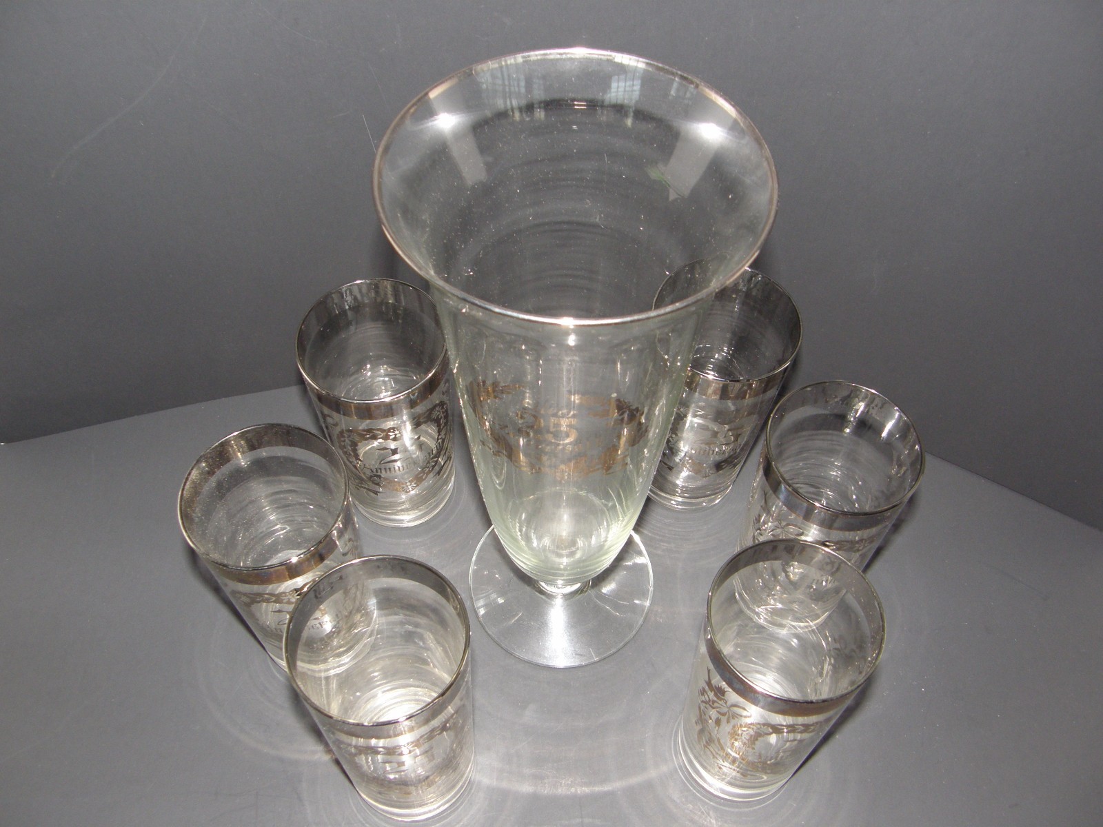 LOT OF 7 PCS. 25th SILVER ANNIVERSARY PITCHER AND GLASS SET WITH SILVER ACCENTS