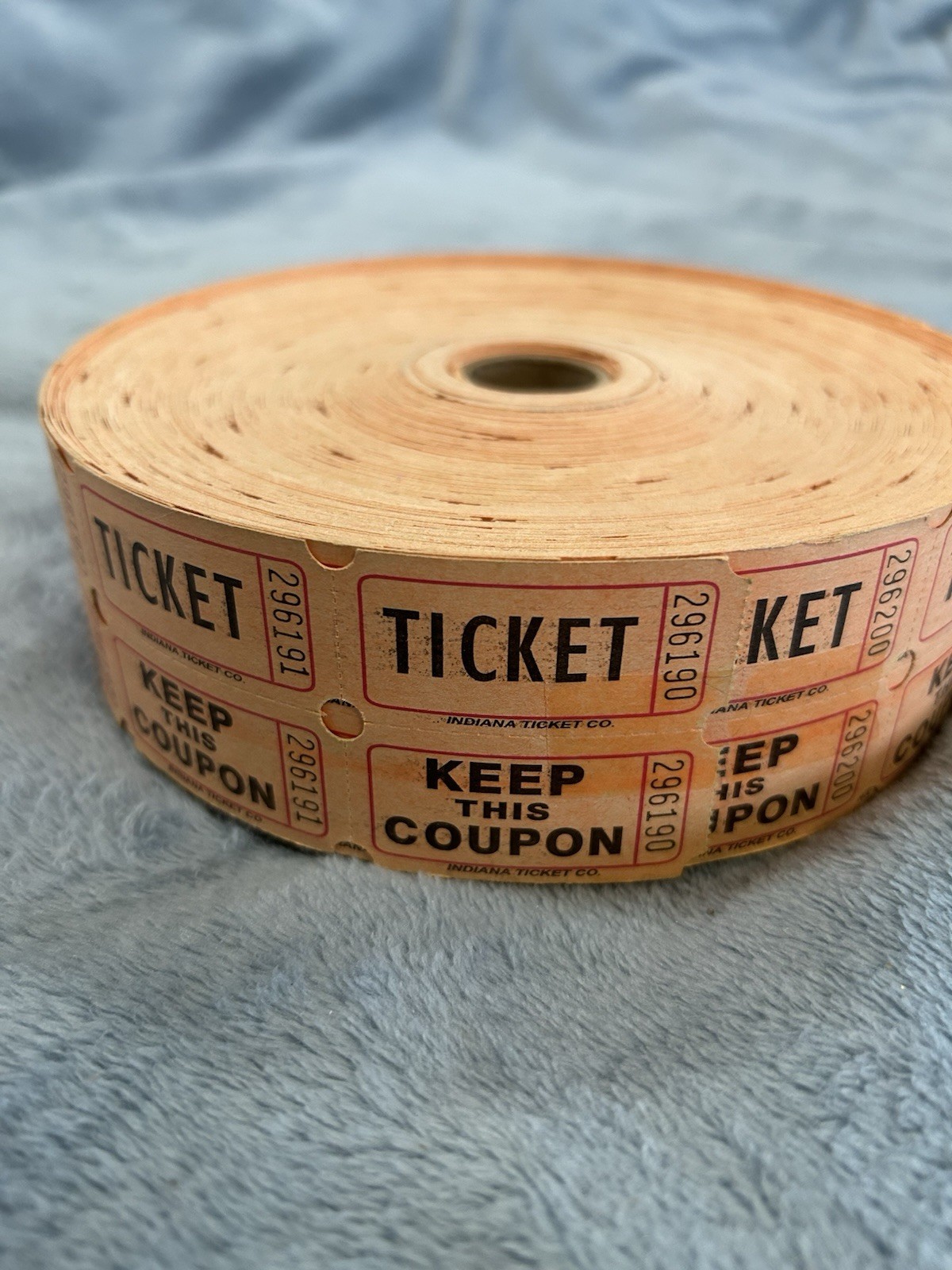 Large Roll of Orange Double Stub Raffle Tickets Split the Pot 50/50.