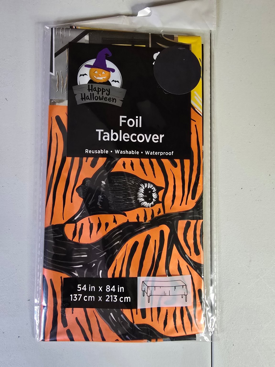 Happy Halloween Foil Tablecover 54×84″ Orange Black Witch Theme Reusable